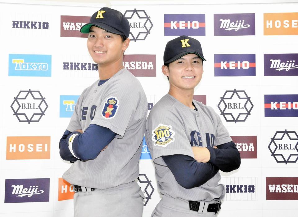 　慶大をまとめる今泉（左）と外丸