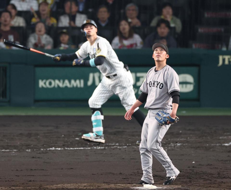 　３回、佐藤輝（奥）に３ランを浴びた赤星（撮影・中田匡峻）