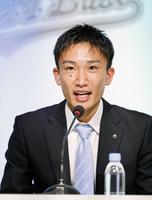 　記者会見で日本代表からの引退を表明したバドミントン男子の桃田賢斗