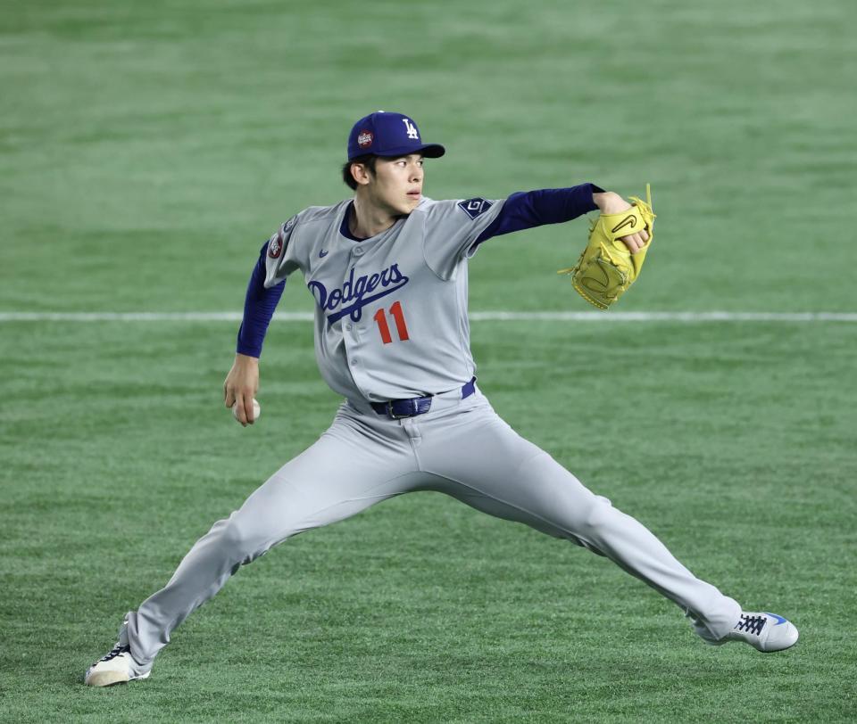 　練習する佐々木
