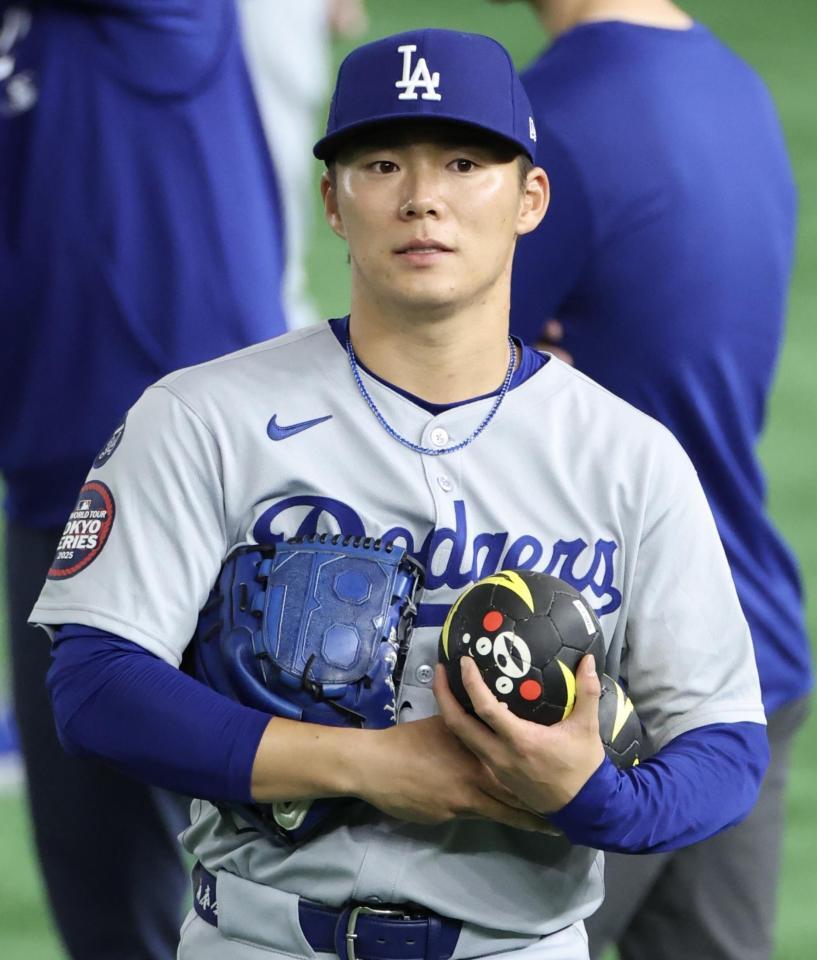 　くまモンボールで練習する山本