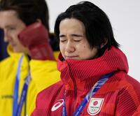 　男子ハーフパイプで金メダルを獲得し、涙ぐむ戸塚優斗＝リビーニョ（共同）