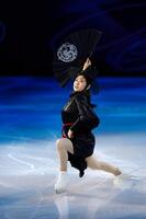 エキシビションで演技する李海仁＝ミラノ（共同）