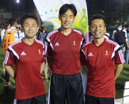 W杯ブラジル大会で開幕戦を担当する(左から)名木利幸副審、西村雄一主審、相楽亨副審=6日、リオデジャネイロ近郊(共同)