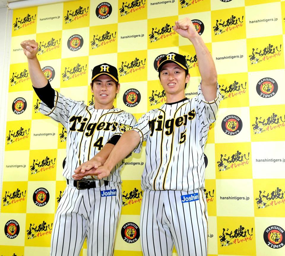 　ファン投票で選出され“矢野ガッツ”で活躍を誓う梅野（左）と近本