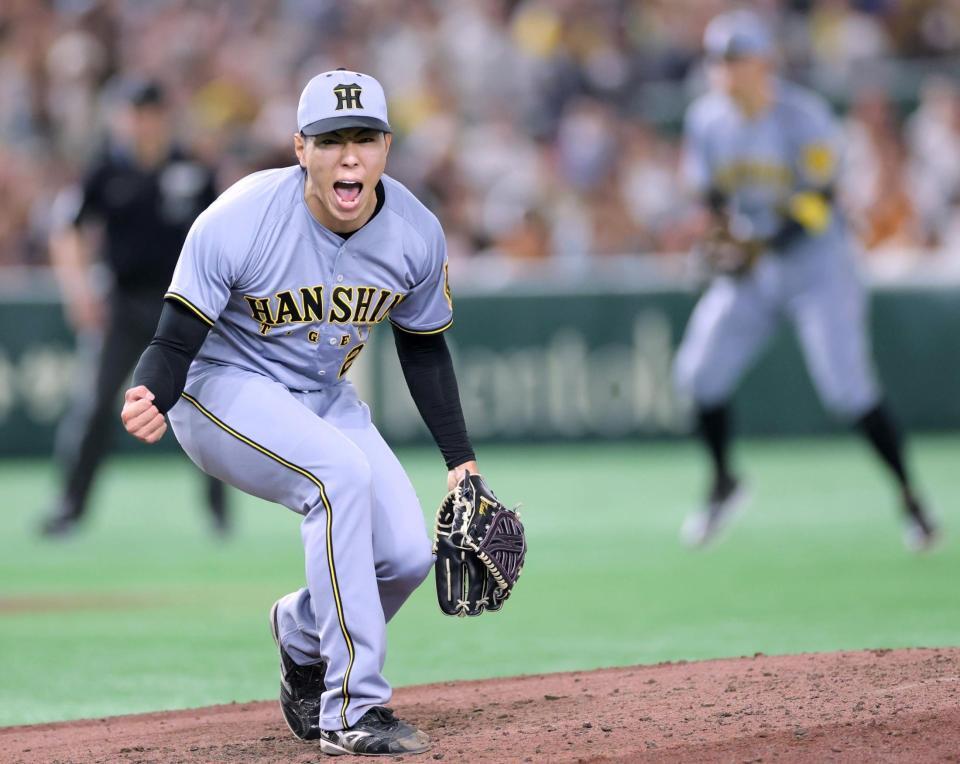 　６回、ピンチをしのぎ、雄たけびを上げる工藤（撮影・西岡正）