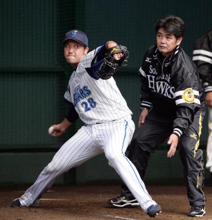 　工藤監督から指導を受ける北方