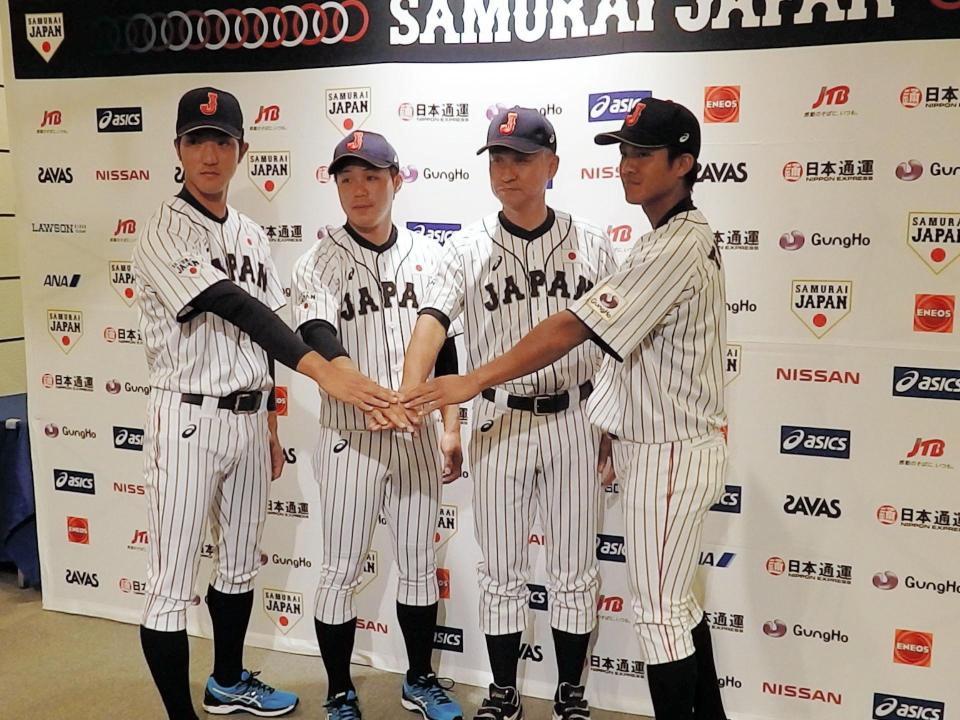 アジア王者を誓った「侍ジャパン」日本代表の田嶋投手、主将の佐藤外野手、石井監督、田中内野手（左から）