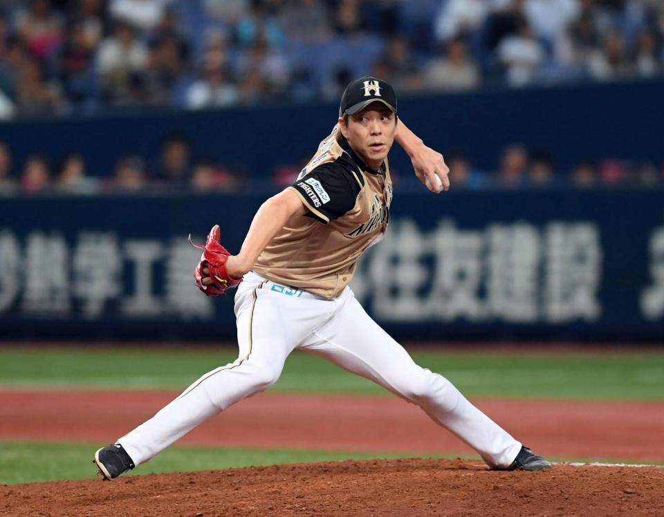 ８回、４番手で登板し力投する日本ハム・宮西尚生＝京セラドーム（撮影・山口登）