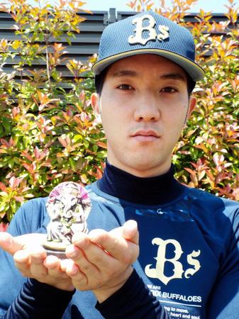 ガネーシャを手にする田嶋