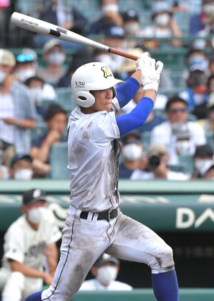 　９回、勝ち越しとなる適時打を放つ明豊・牧野（撮影・北村雅宏）