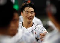 　２回、生還し、笑顔を見せる丸田（共同）