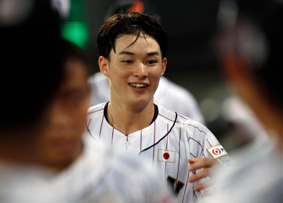 　２回、生還し、笑顔を見せる丸田（共同）