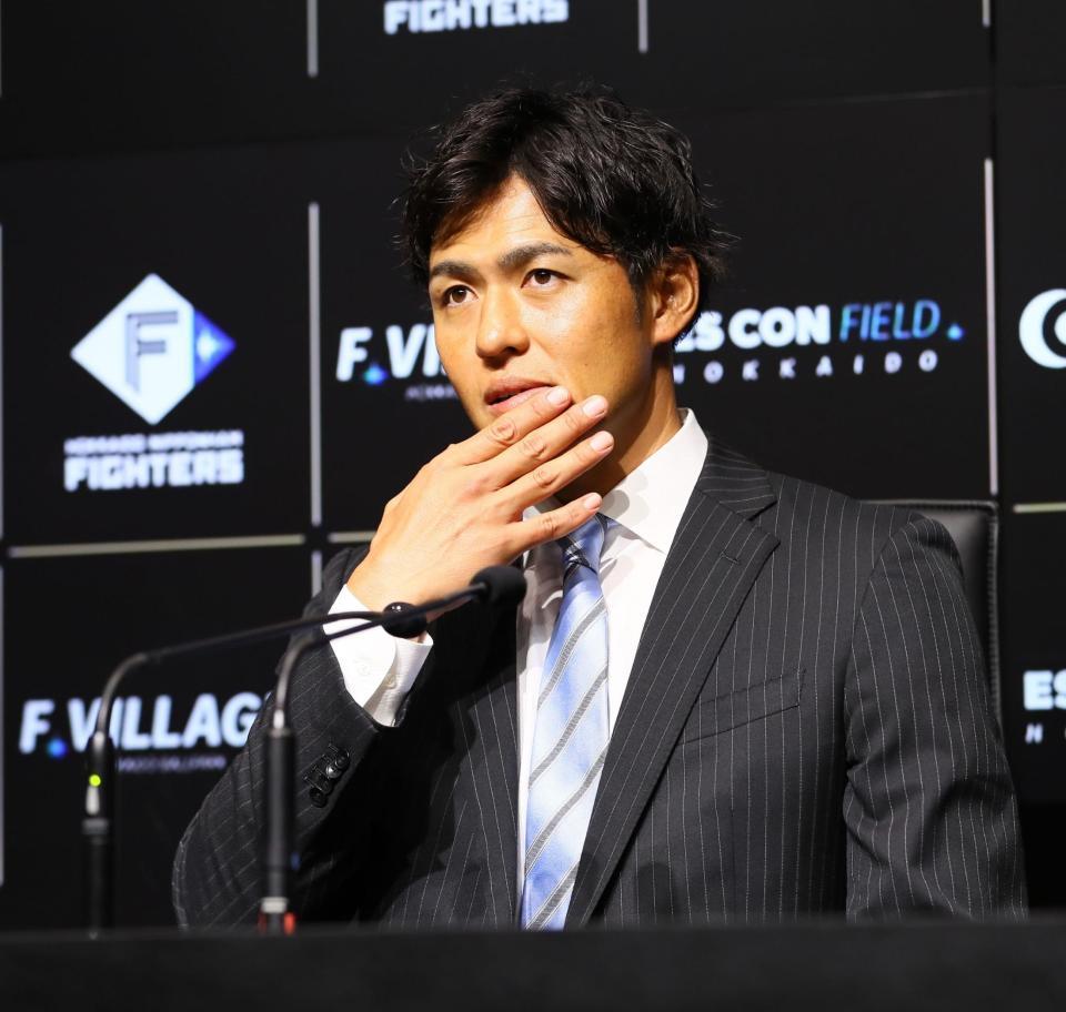 　引退会見で質疑応答に応える木村（撮影・中島達哉）