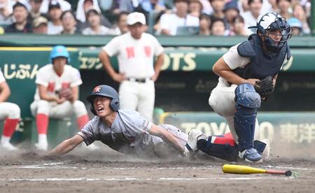 　４回、西村の適時打で生還する奥井