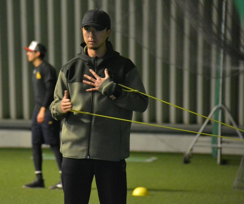 チューブでアップをする上沢