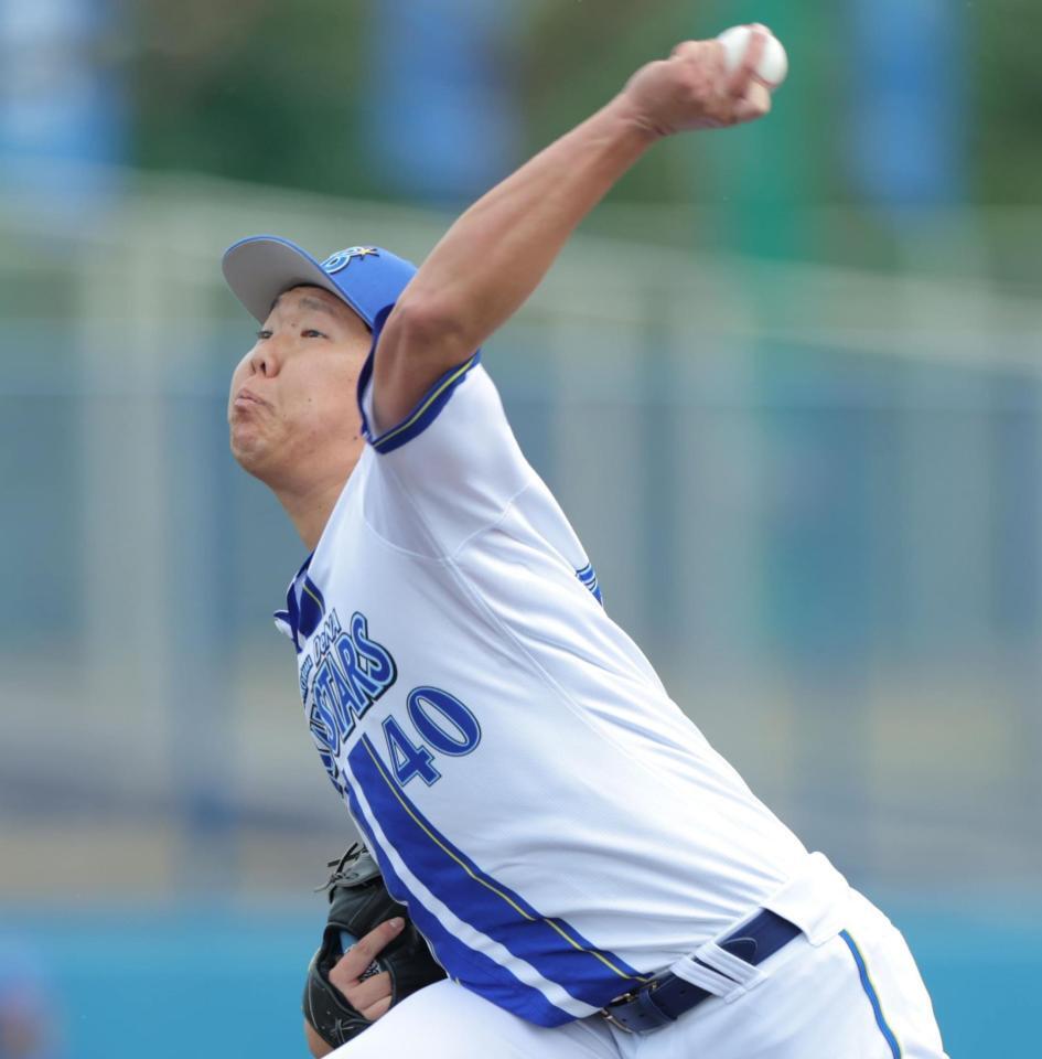 　力投する松本隆