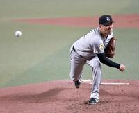 　中日相手に力投する田中将