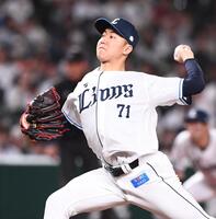 　力投する菅井（撮影・園田高夫）