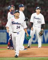 　７回途中、降板する田口