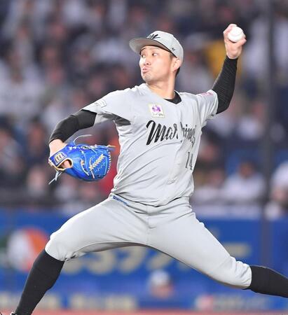 　力投する小島（撮影・開出牧）