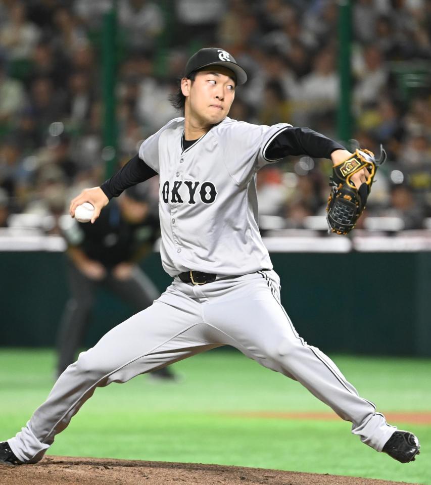 　力投する巨人先発の山崎