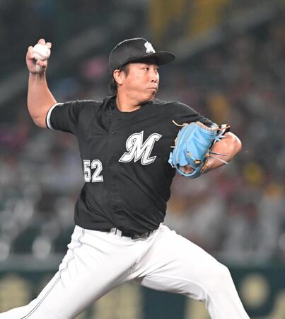 　７回、力投する益田（撮影・飯室逸平）