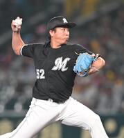 　７回、力投する益田（撮影・飯室逸平）