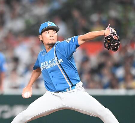 　力投する伊藤（撮影・園田高夫）