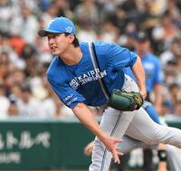 　力投する達（撮影・園田高夫）