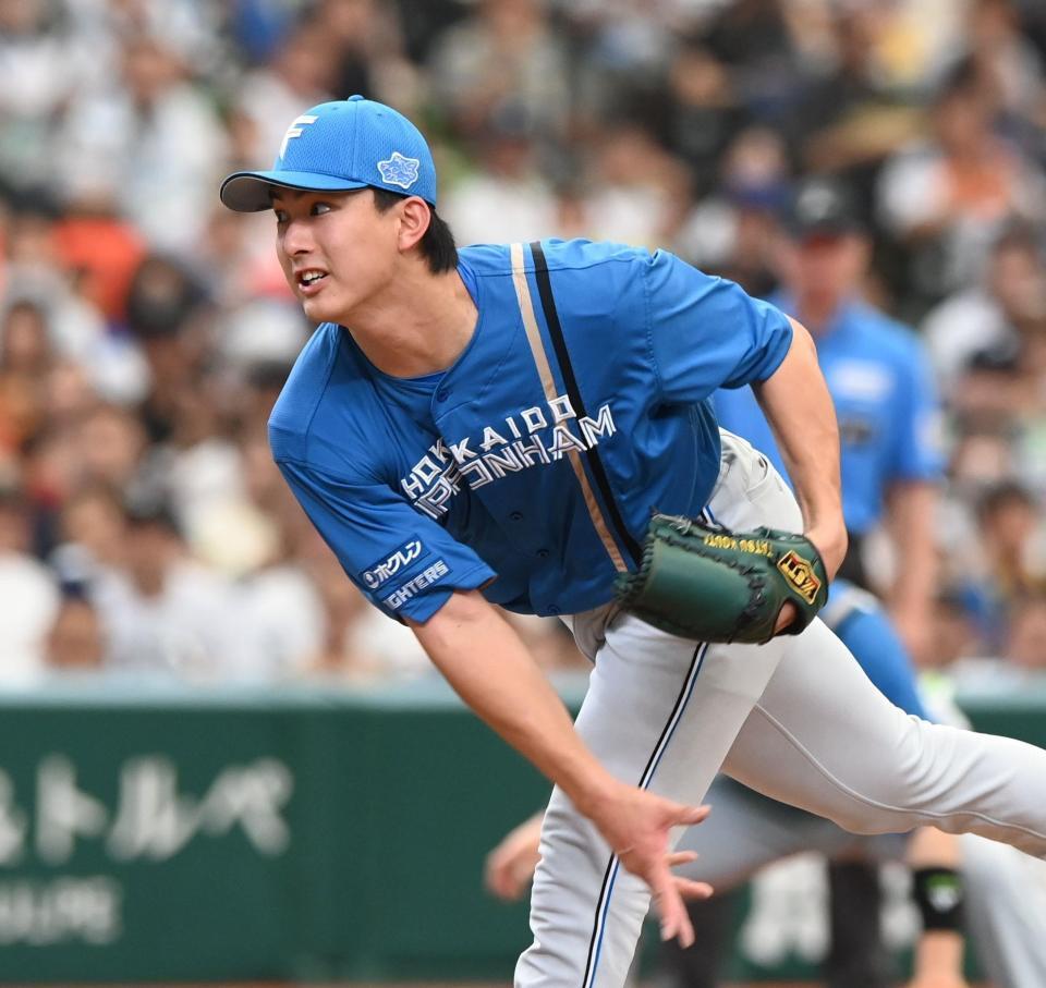 　力投する達（撮影・園田高夫）