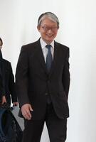 　笑顔で会議に臨む巨人・山口寿一オーナー（撮影・金田祐二）