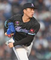 　力投する小島（撮影・開出牧）