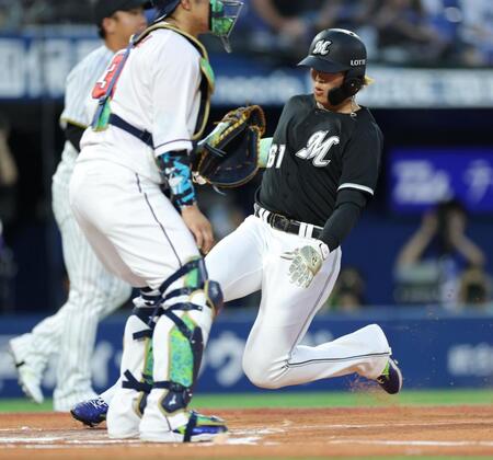 　１回、西川の犠飛で生還する山本（撮影・西岡正）