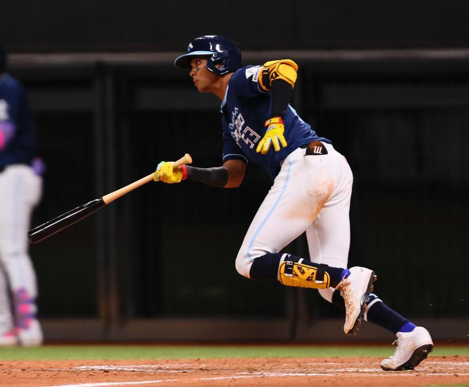 　５回、勝ち越しとなる中前適時打を放つ水谷（撮影・中島達哉）