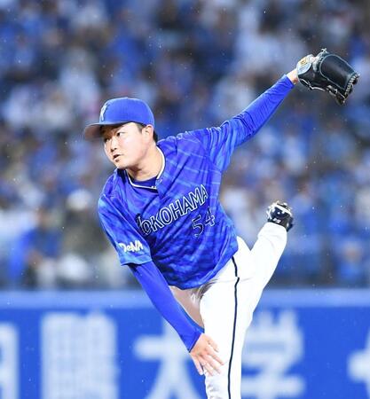 　力投する石田裕（撮影・園田高夫）