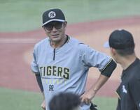 　笑顔を見せる田中コーチ（撮影・田中太一）