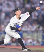 　力投する小島（撮影・開出牧）