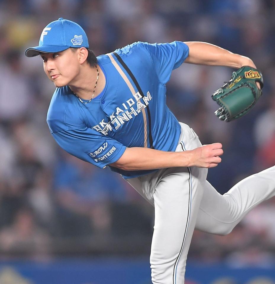 　力投する達（撮影・開出牧）