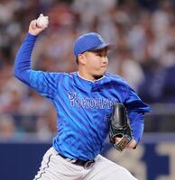 　先発し力投する石田裕