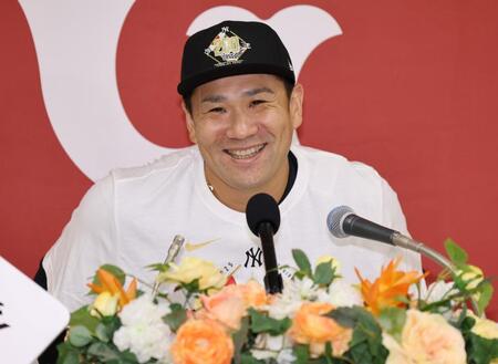 　日米通算２００勝を達成し、会見で思いを語る田中将