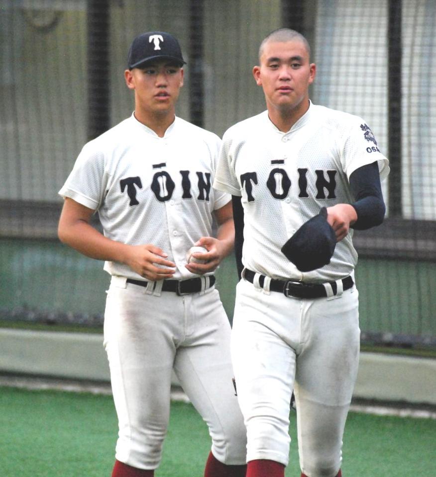 　大阪桐蔭・中村（左）