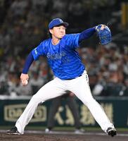 　力投する先発の竹田