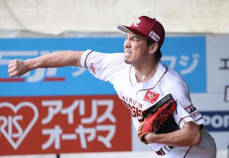 ブルペンで投げる前田健（撮影・佐々木彰尚）