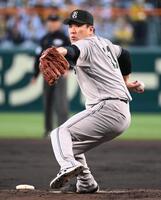 力投する巨人先発の田中将