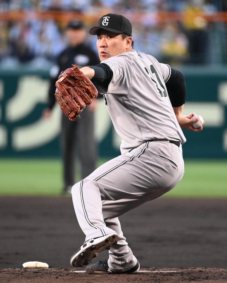 力投する巨人先発の田中将