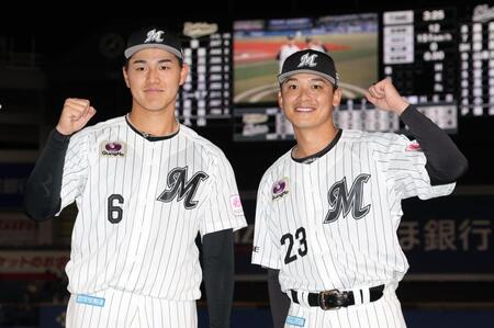 ヒーローの西川と石川慎（撮影・金田祐二）