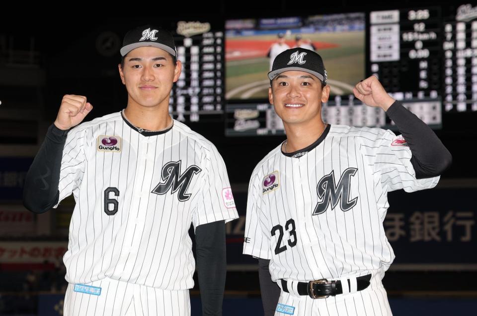 ヒーローの西川と石川慎（撮影・金田祐二）