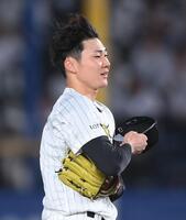 ３回、強風で帽子が飛ばされた広池（撮影・開出牧）