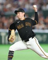 力投する竹丸（撮影・金田祐二）